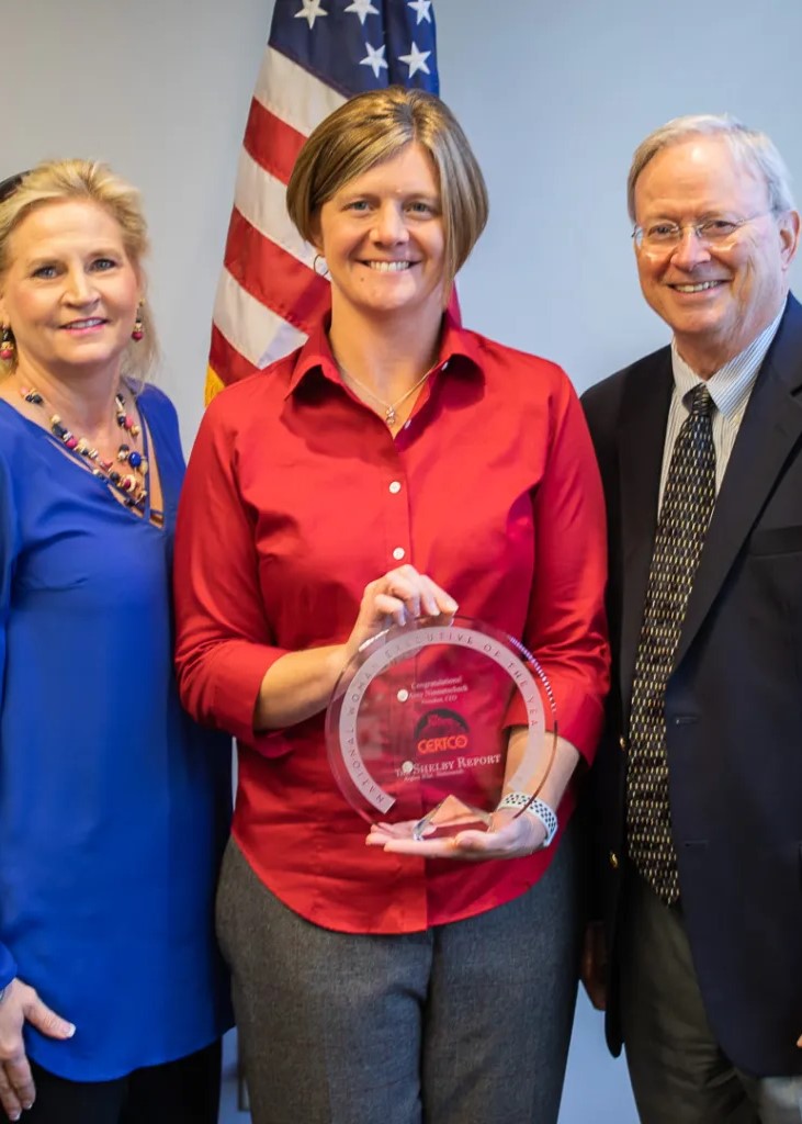 Winners holding check