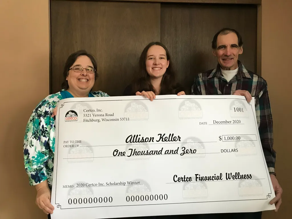 Winners holding check