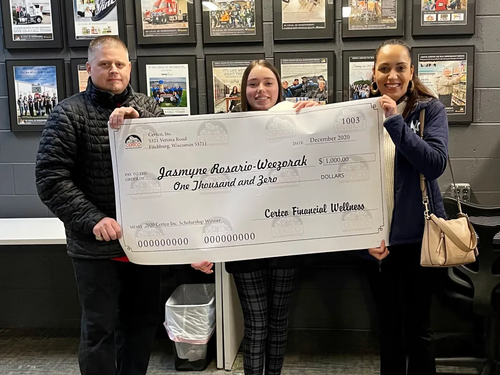 Winners holding check