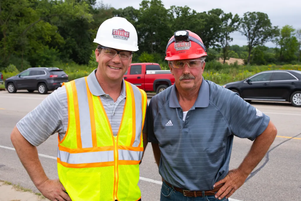 Winners holding check