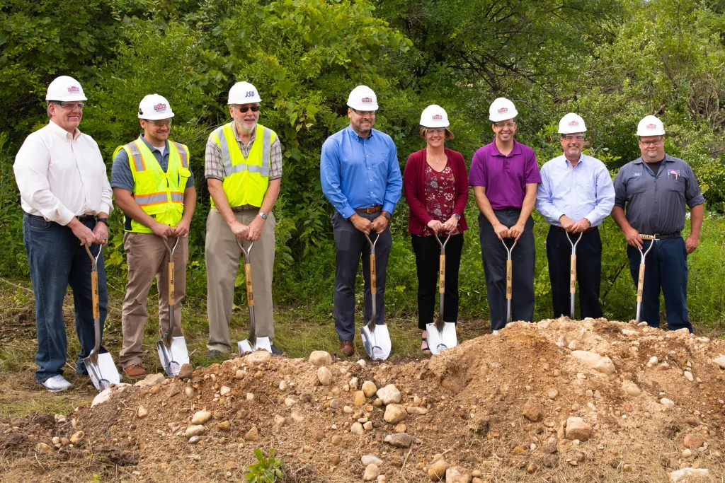 Winners holding check