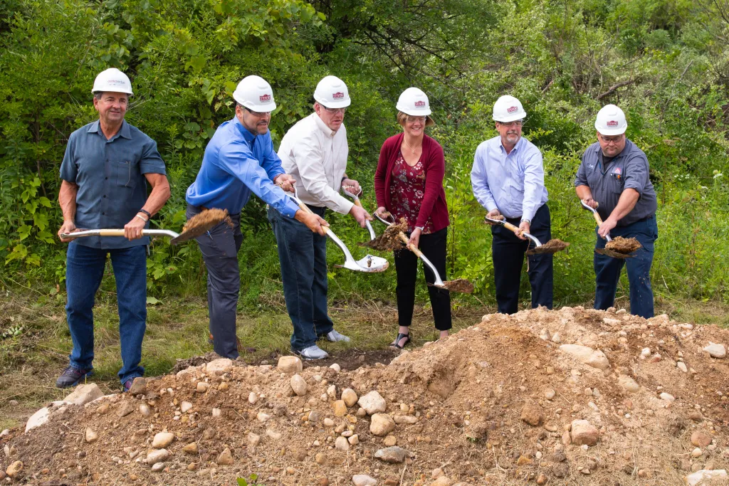 Winners holding check