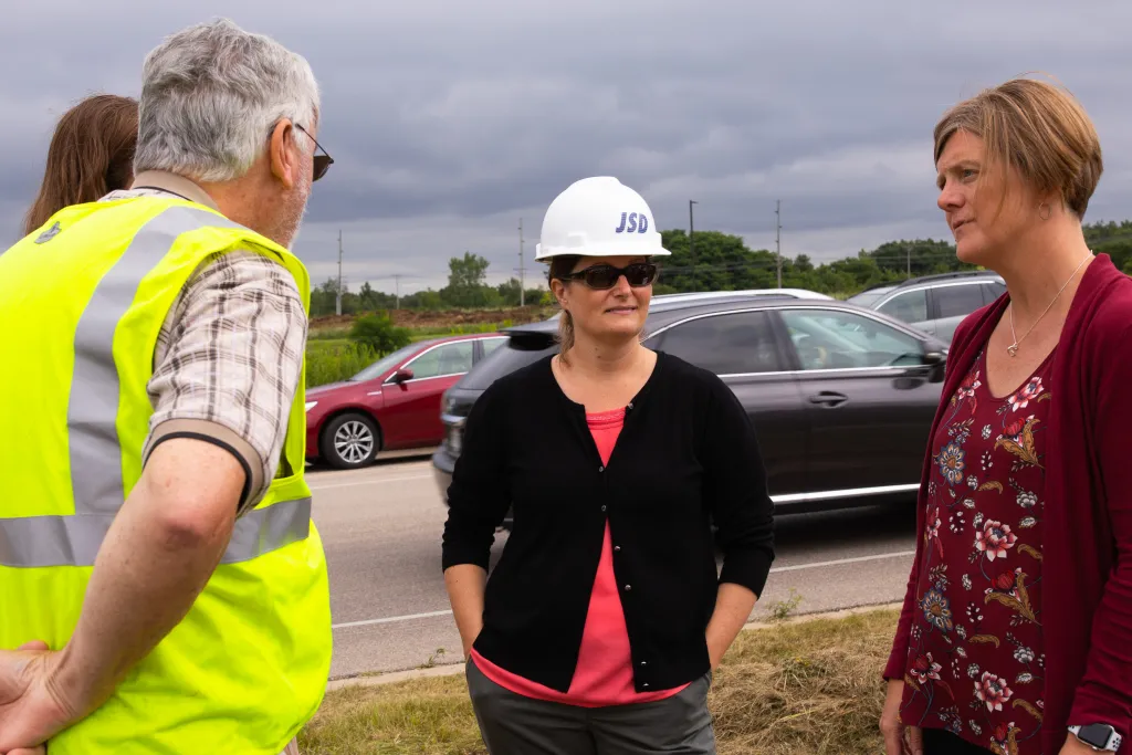 Winners holding check