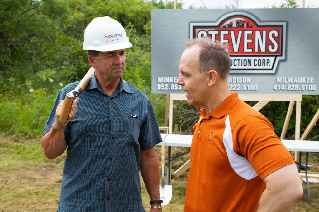 Winners holding check