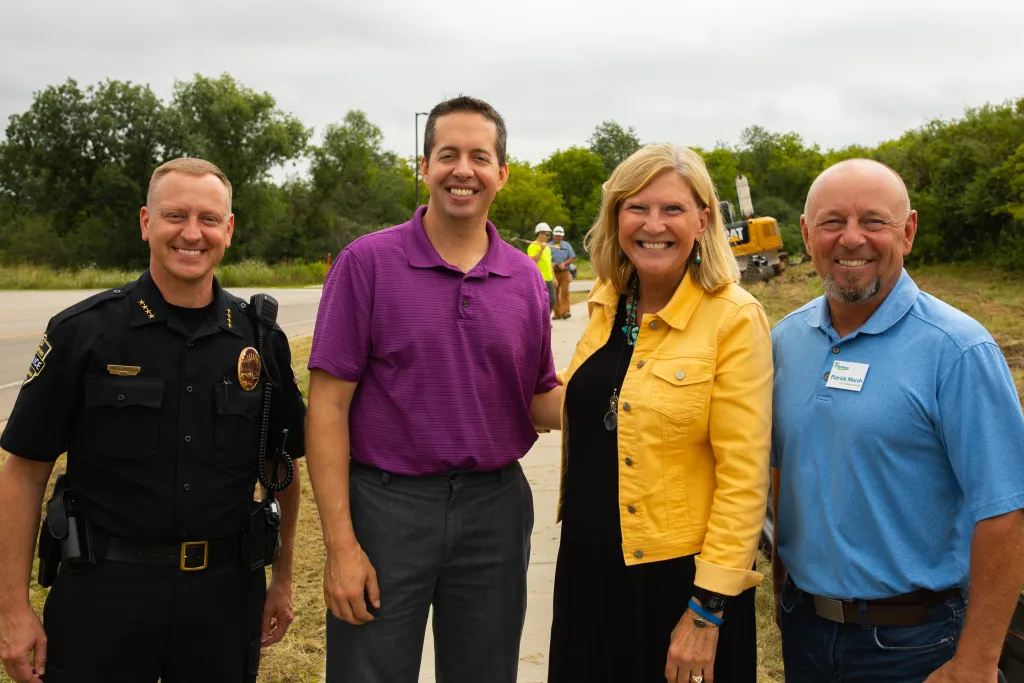 Winners holding check