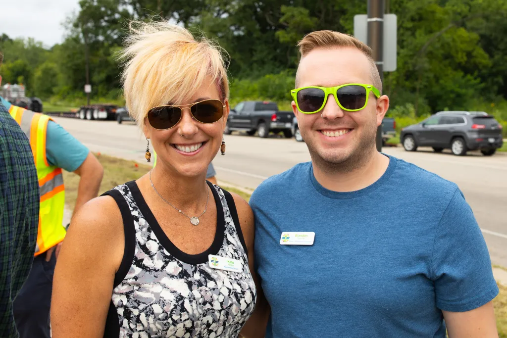 Winners holding check