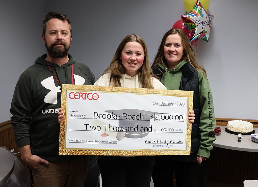 Winners holding check