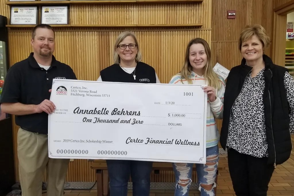 Winners holding check