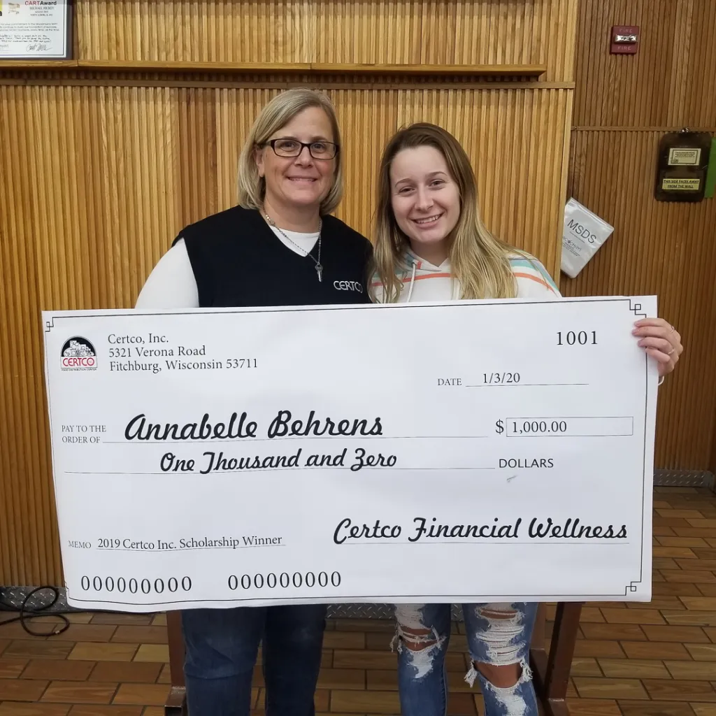 Winners holding check