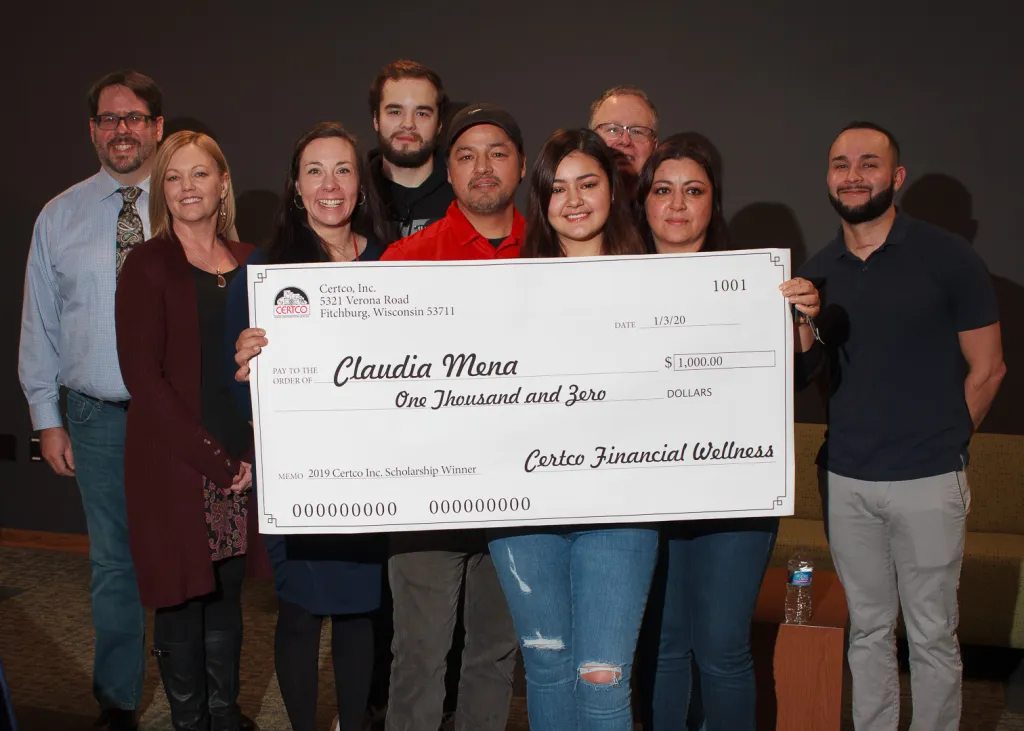 Winners holding check