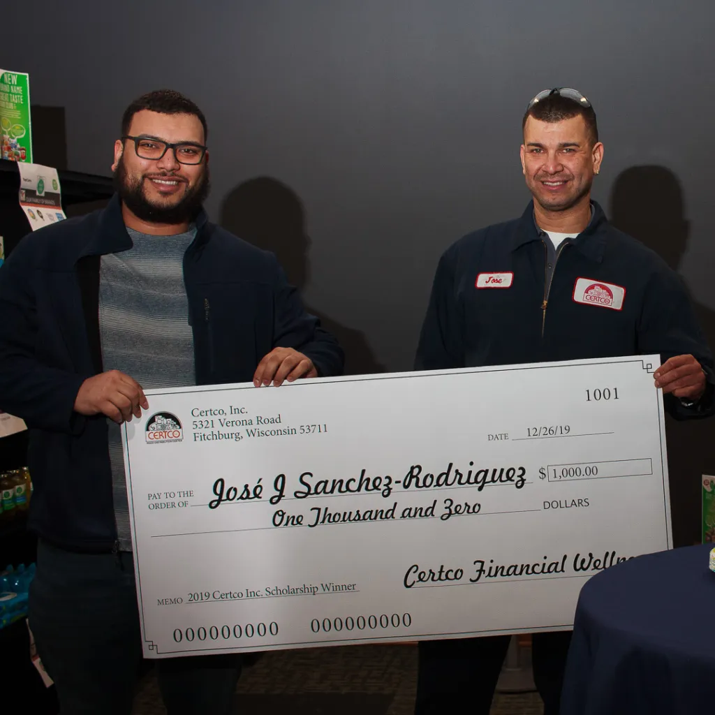 Winners holding check