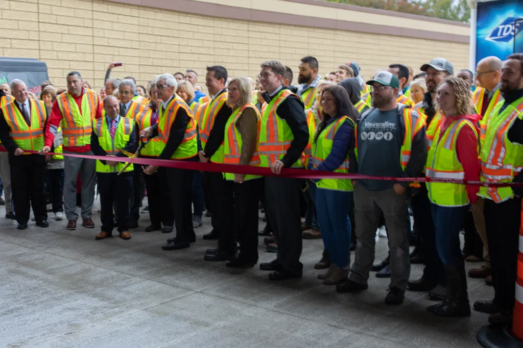 Winners holding check